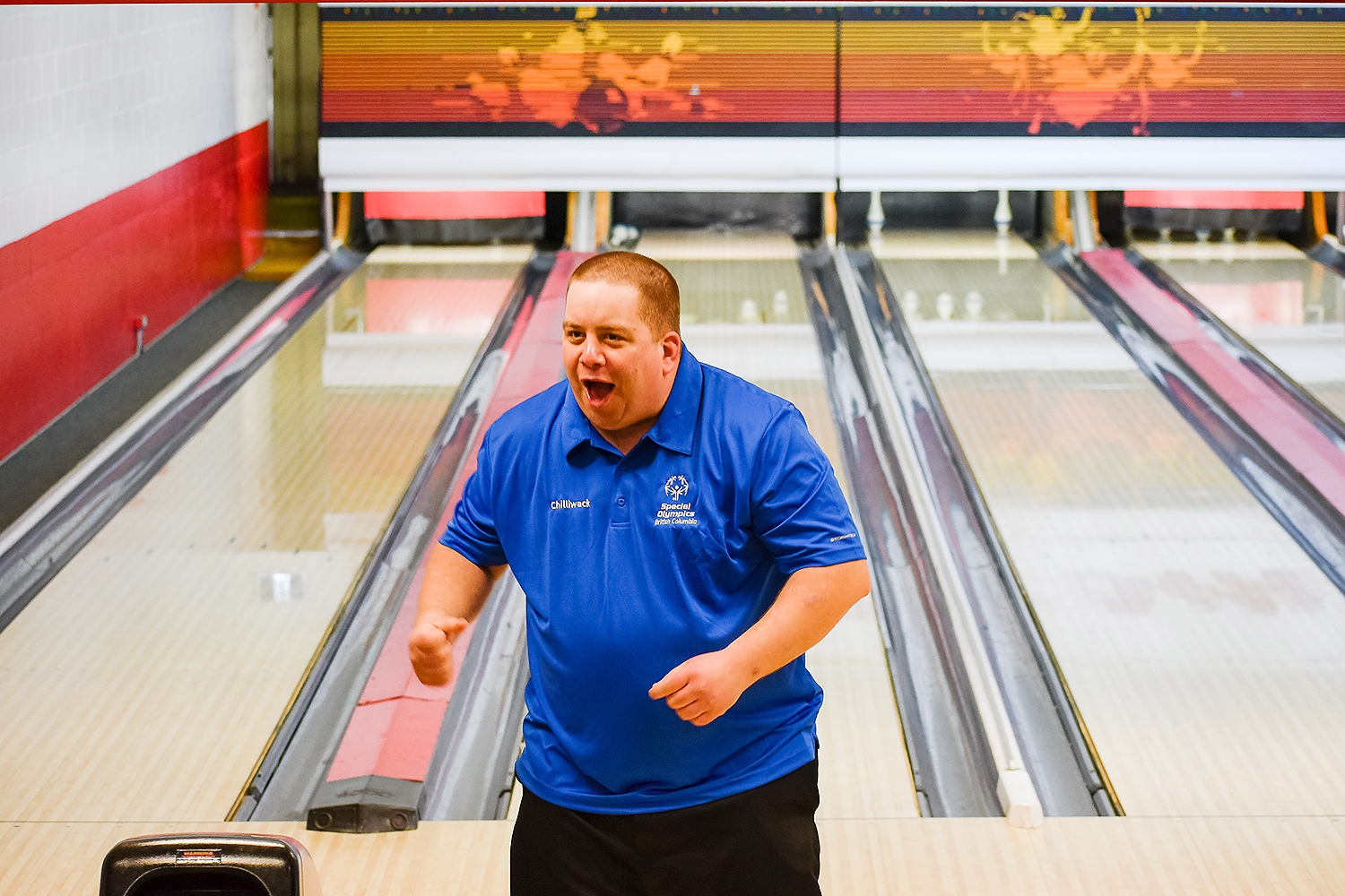 Special Olympics BC - Chilliwack bowling athlete celebrates a strike. Special Olympics BC - Chilliwack bowling athlete celebrates a strike.